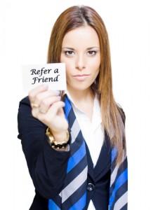 Woman Holding Refer a Friend Card