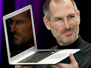 Steve Jobs Holding Mac